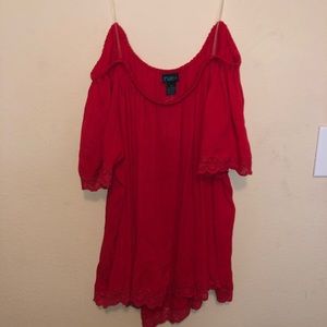 Red off the shoulder shirt.